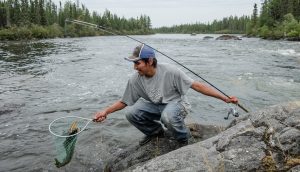 Orion McKay catches some pickerel for dinner on the Fawn River