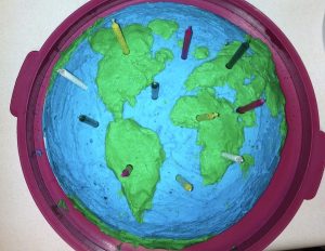 Earth Day birthday cake. A\J Alternatives Journal.