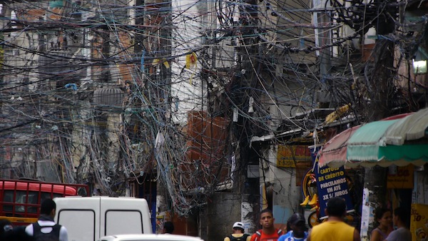 Electric wires in a slum in Brazil in a scene from PANDORA’S PROMISE. Photo credit: Robert Stone