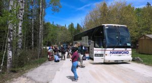 ParkBus unloading at Cyprus Lake Campground. Alternatives Journal. A\J.