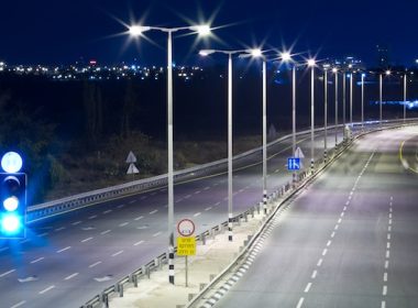 streetlights along straightaway A\J AlternativesJournal.ca