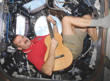 Colonel Chris Hadfield playing guitar in the International Space Station.