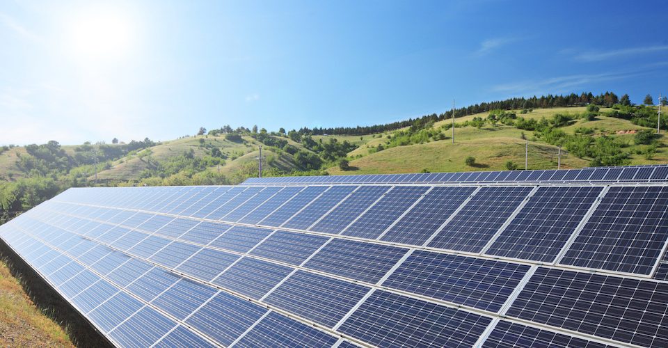 Solar photovoltaic cell panels under sunny sky