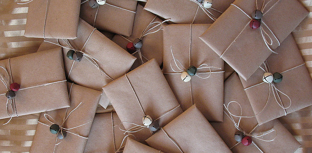 Packages in brown paper with string and bells.