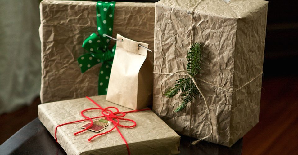 Brown paper packages tied up with string by Susy Morris