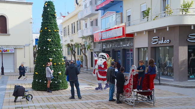 Santa and sleigh in a town square in Kos, Greece.