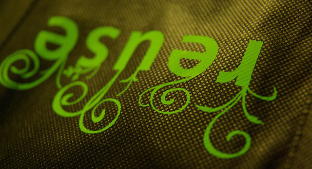 Reusable bag with "resuse" written on it.