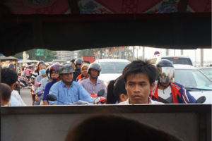 The view from a back window of a tuk-tuk in Phnom Penh