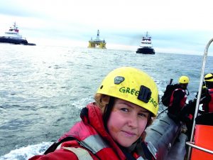 Emily Hunter, woman on a science boat on ocean